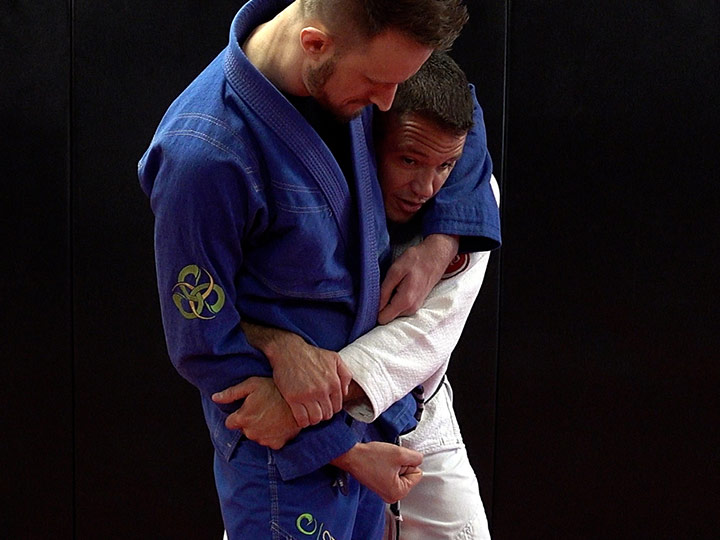 Professor James Clingerman demonstrating basic BJJ Self Defense Concepts, how to clinch while standing.